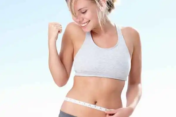 woman happy after fat reduction treatment Macclesfield