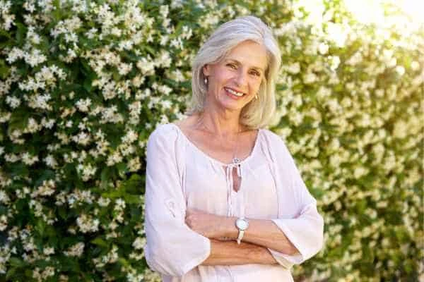 Older woman happy with urinary incontinence treatment Macclesfield