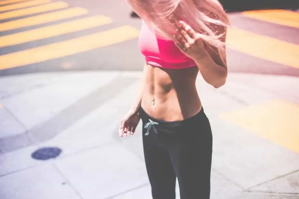 Woman with toned stomach after LA-EMS Body Sculpting Treatment Macclesfield